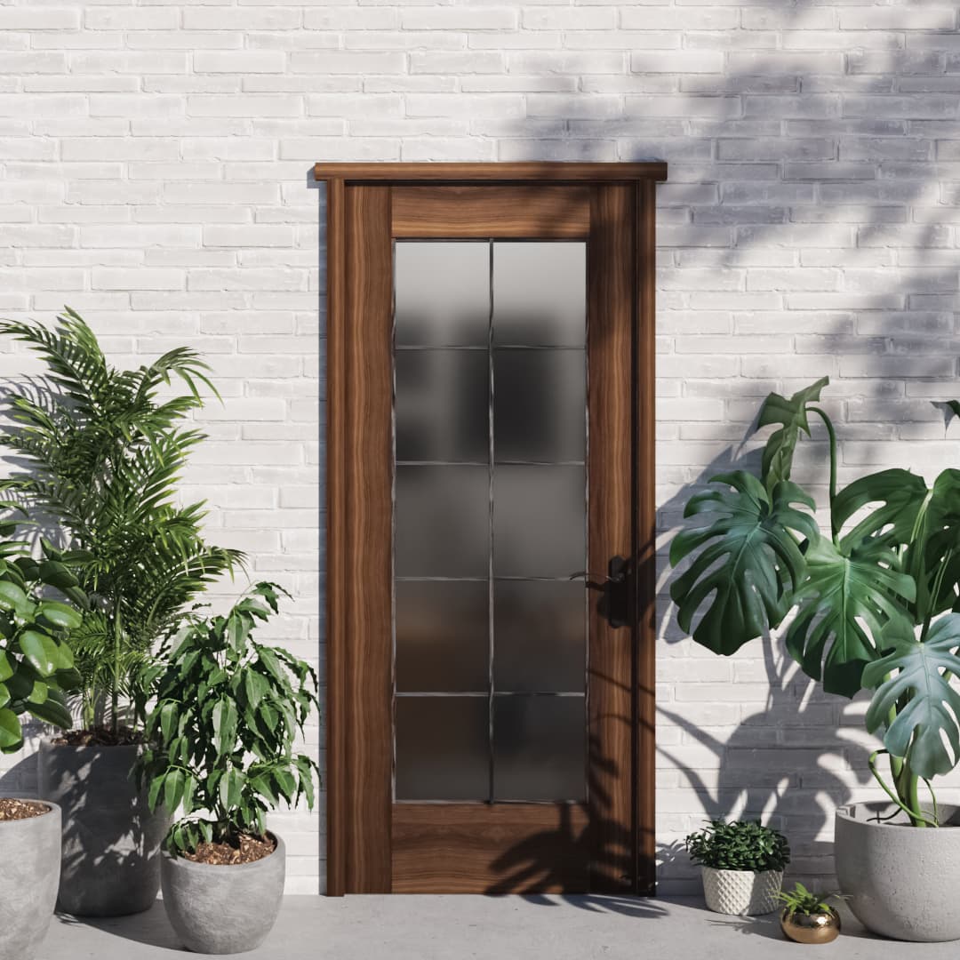 Full French Glass Exterior Front Door in a patio area next to plants