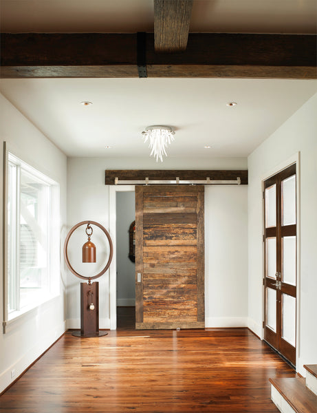 reclaimed wood barn door in a minimalist setting