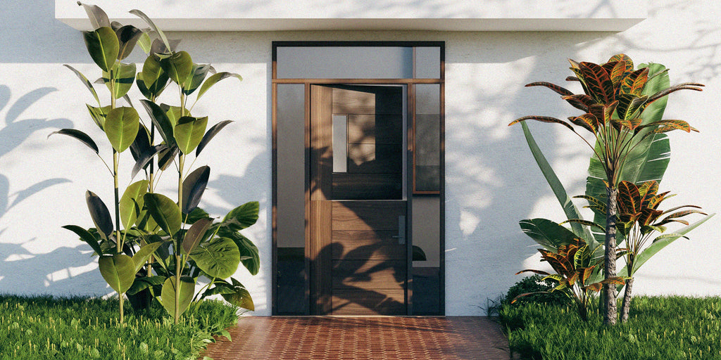 Peninsula Dutch door on a white house with tropical plants.