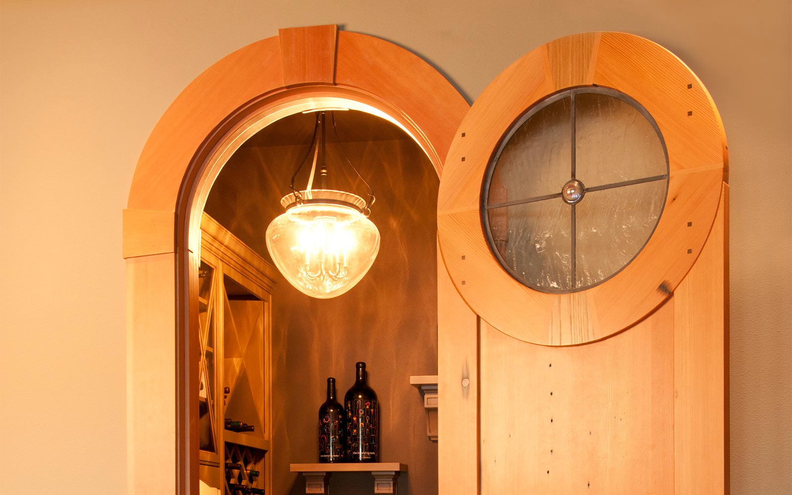 round top interior door with a leaded glass circular window