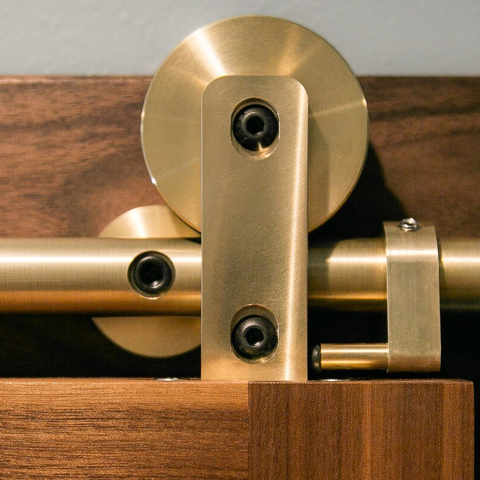 1. Swiss Rod Brass Sliding Barn Door Hardware invokes a luxurious feel