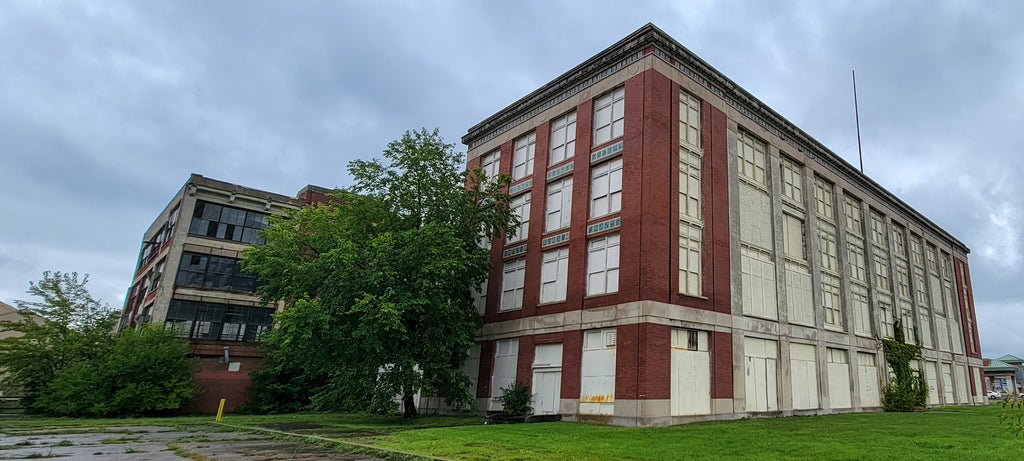 Small Pewabic tile features under a number of windows visible on the Highland Park Plant’s exterior as it stands today.