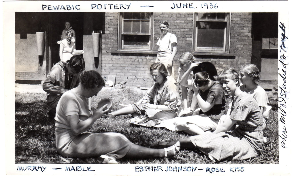 Black and white photo of Wayne State University students on the lawn of Pewabic Pottery in 1936.
