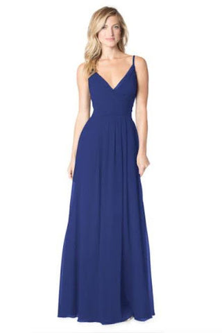 Spaghetti strap dress in royal blue with pleated V-neck bodice, sheer trim neckline and sheer side panels, and center front pleated skirt.
