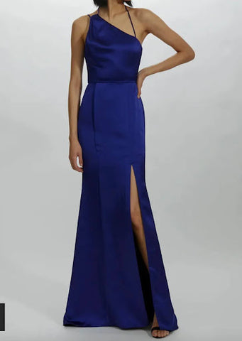 Full-length bridesmaid gown in cobalt blue with a side slit up to mid-thigh