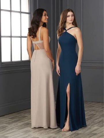 This chiffon halter is chic and sultry featuring an open back, slim A-line skirt, and a front skirt slit.