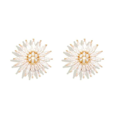 Featuring 14K gold-plated brass hardware and glass crystals on a stainless steel post, these are a go-to style that remains effortlessly stylish whether worn alone or layered with other minimalist earrings.