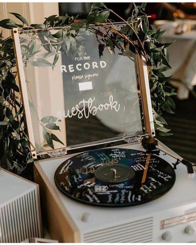 Record player singed with wedding guest signatures