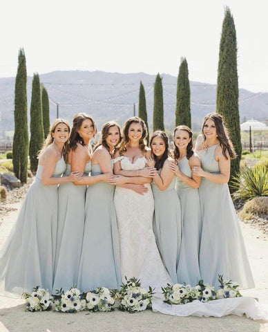 Bride posing with bridesmaids
