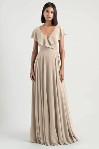 Model wearing Jenny Yoo Bridesmaid Dress Faye in tan