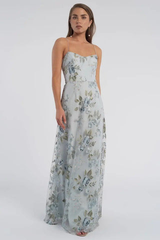 Model wearing Jenny Yoo Drew dress in enchanted floral serenity blue