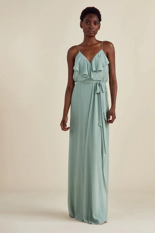 Model wearing Nouvelle Amsale Drew dress in dusty blue