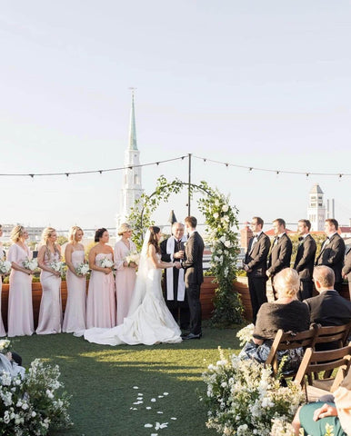 Bride and groom saying wedding vows at wedding ceremony