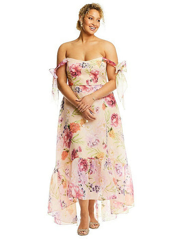 Model wearing Alfred Sung D846FP bridesmaid dress in pink floral pattern