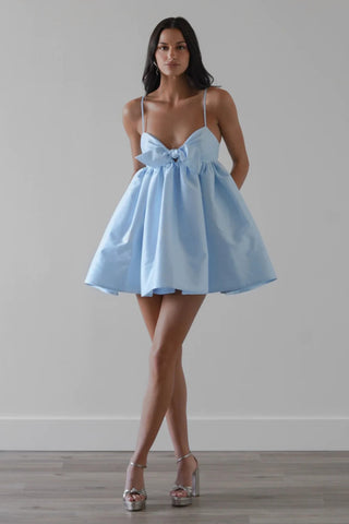 Model wearing Watters Pixie Dress in blue