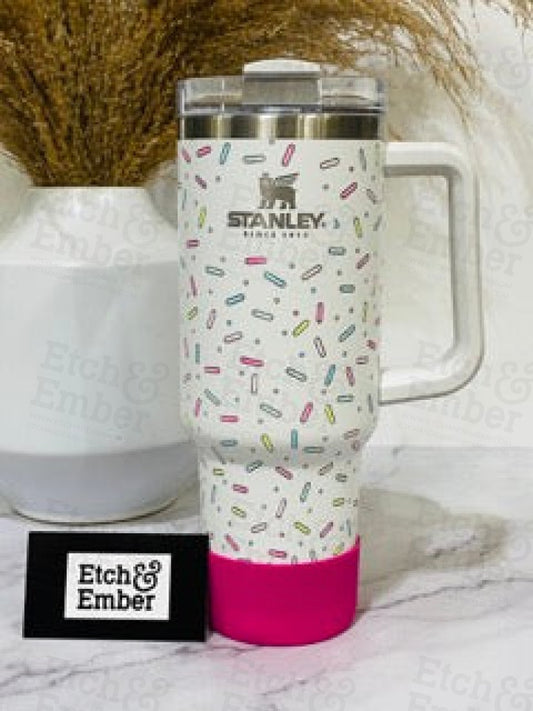 https://cdn.shopify.com/s/files/1/0115/1683/7945/files/sprinkles-custom-with-surprise-coordinating-boot-engraved-stanley-adventure-quencher-40oz-tumbler-tumblers-756.jpg?v=1684998044&width=533