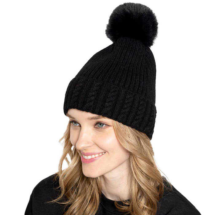 cable knit beanie with faux fur pom