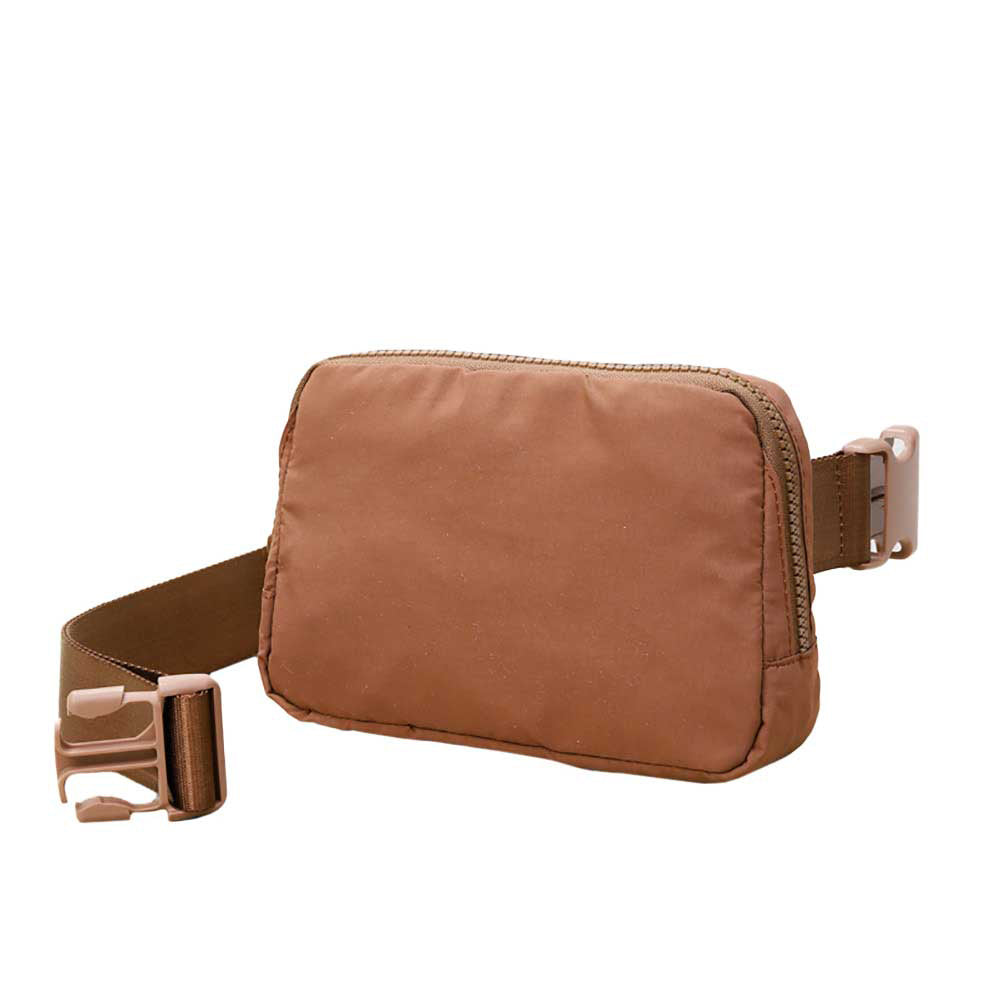 Brown Solid Puffer Sling Bag, show your trendy side with this awesome solid puffer sling bag. It's great for carrying small and handy things. Keep your keys handy & ready for opening doors as soon as you arrive. The adjustable lightweight features room to carry what you need for those longer walks or trips. 