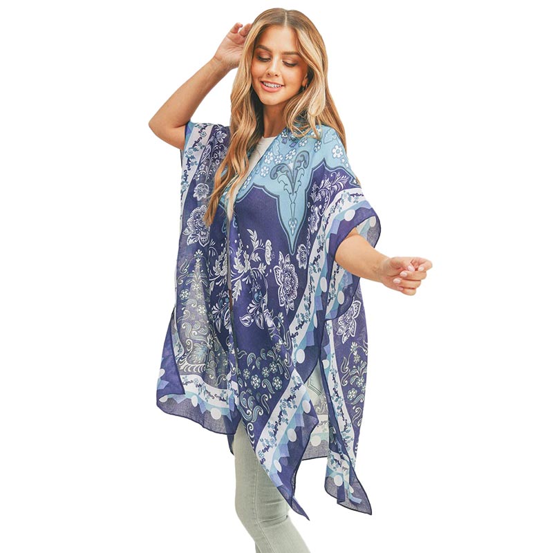 Navy Floral Patterned Cover Up Kimono Poncho, this timeless floral patterned Kimono Poncho is Soft, Lightweight, and Breathable Fabric, Close to the Skin, and Comfortable to Wear. Sophisticated, flattering, and cozy. look perfectly breezy and laid-back as you head to the beach. A fashionable eye-catcher will quickly become one of your favorite accessories.