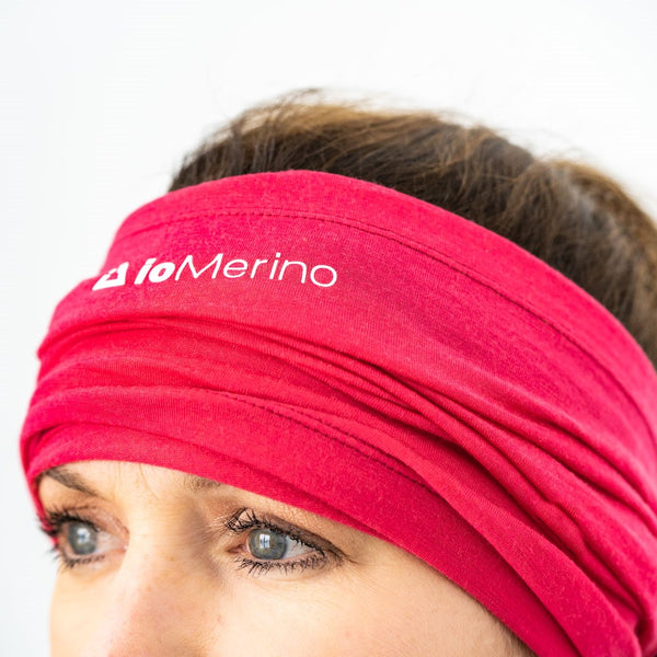 Woman wearing pink Neck Warmer as a headband