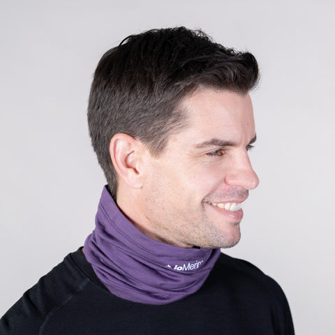 Model wearing ioMerino's Unisex Altitude Neck Warmer in Gothic Grape