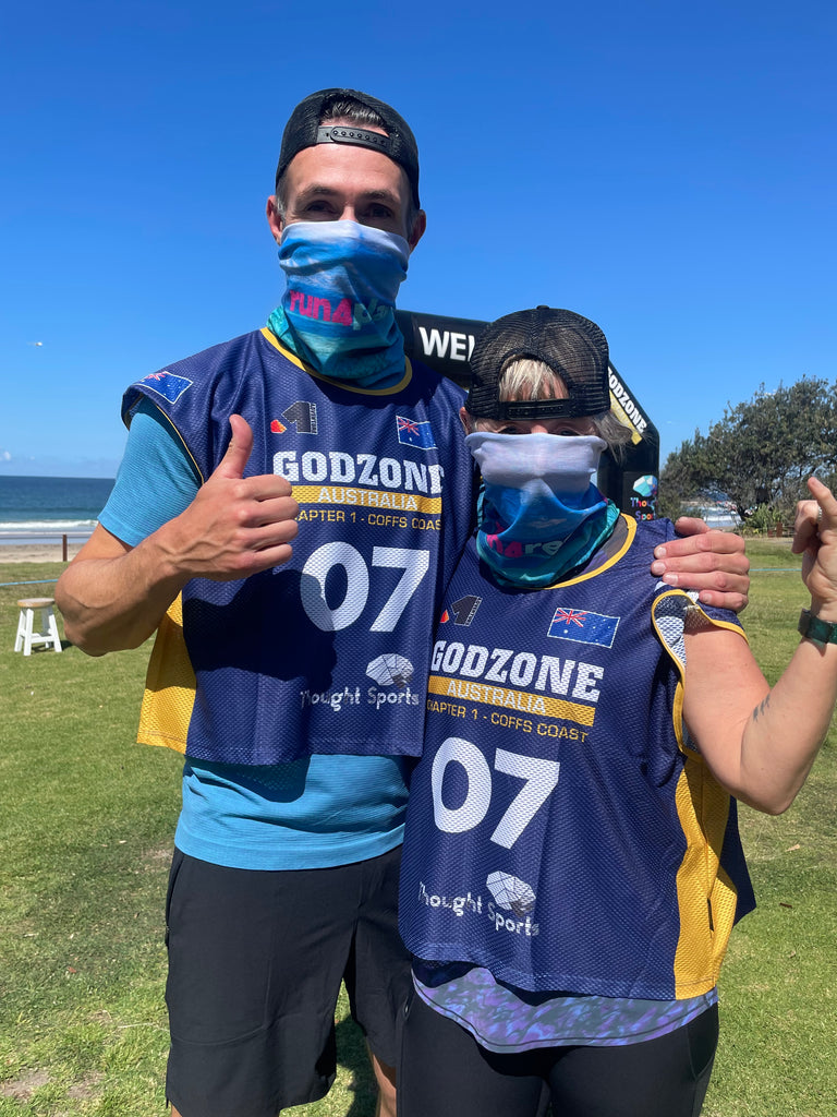 Image of Morgan with a team mate in front of the Godzone starting line.