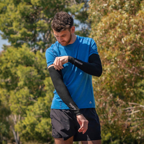 Man wearing ioMerino arm warmers