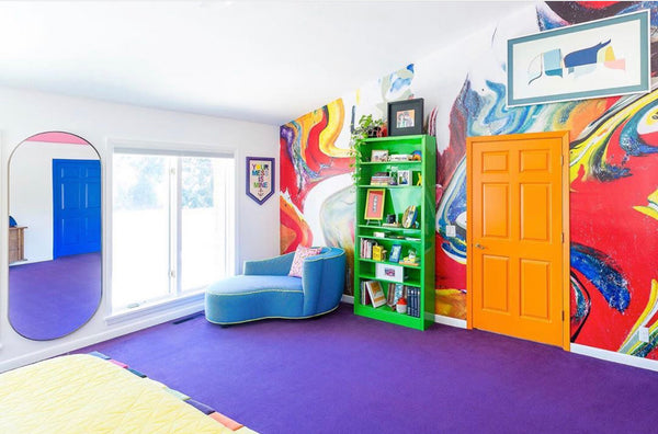 Bold bedroom with wallpaper feature wall