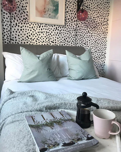 Black and white bedroom wallpaper feature wall