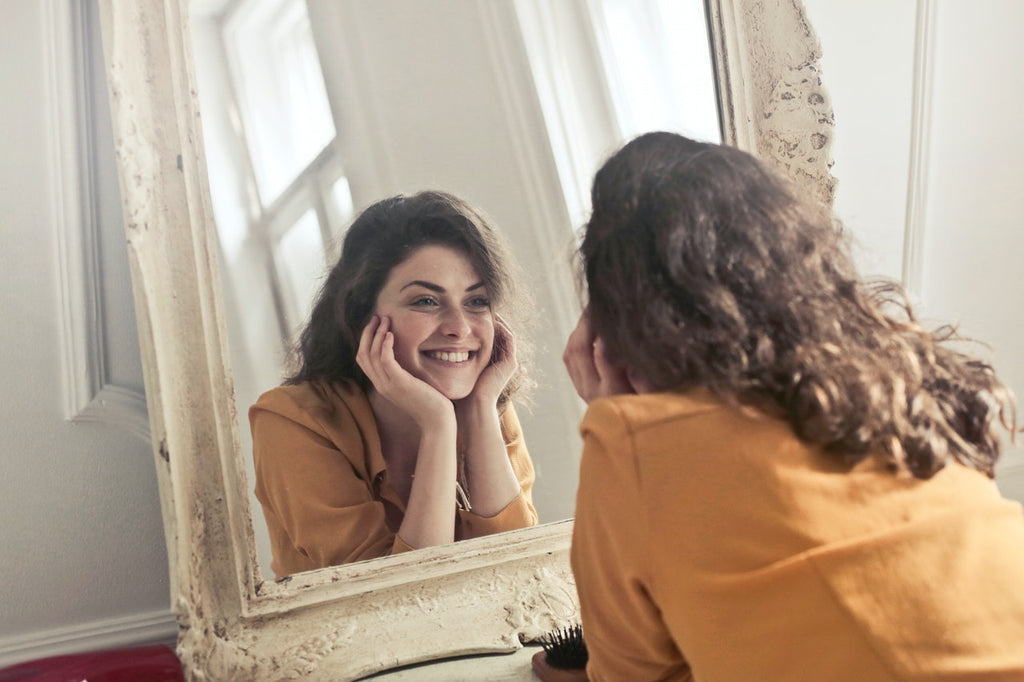 1 hour morning routine - smile at yourself in the first mirror you see - Living a Sweeter Life Blog