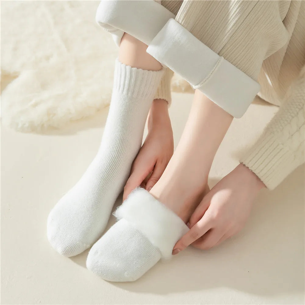 A woman wears a pair of Winter Socks by Fleece Chic