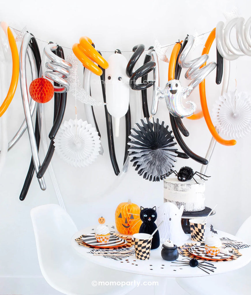 Momo Box Spooky Fun Halloween Party Box featuring fun and adorable Halloween decorations, tableware and centerpiece in classic Halloween colors of black and orange. Featuring Halloween characters including pumpkins, ghosts, black cats, spiders and more this party box has pretty much everything you need to throw a fun Halloween bash this season!