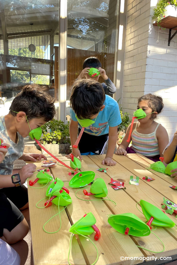 Momo-Party_Bug-Themed-Birthday-Party_Insect themed Kids Activities with the lizard mask for a catch the bug game