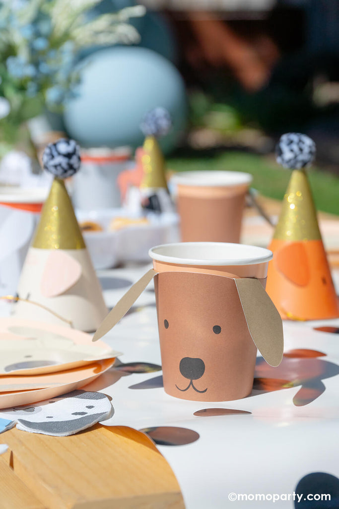 Momo-Party_IT’S-PAW-TY-TIME_Puppy-Themed-Birthday-Party_Puppy-Cup with floppy ears on kid's party table.