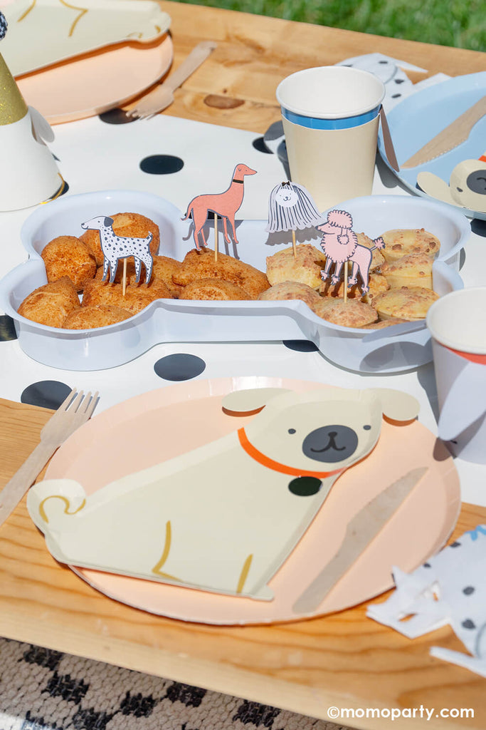 Momo-Party_IT_S-PAW-TY-TIME_Puppy-Themed-Birthday-Party_Tableware_480x480.jpg?v=1696483274" alt="Momo-Party_IT’S-PAW-TY-TIME_Puppy-Themed-Birthday-Party_Dog themed Tableware on kid's party picnic table" data-mce-fragment="1" data-mce-src="https://cdn.shopify.com/s/files/1/0115/4056/1978/files/Momo-Party_IT_S-PAW-TY-TIME_Puppy-Themed-Birthday-Party_Pug Shaped Plates on kid's party table