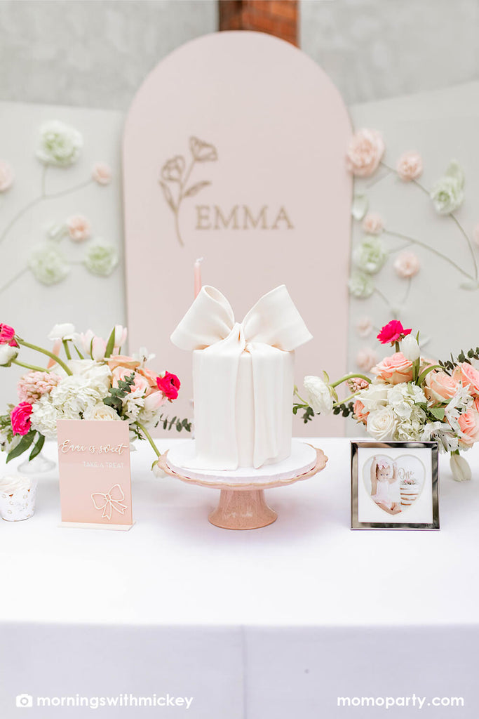 Momo Party_Baby girl's bunnies and bows first birthday party Dessert Table