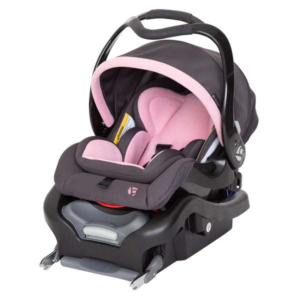 newborn girl carseat and stroller