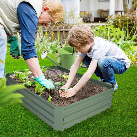 A child planting with his father