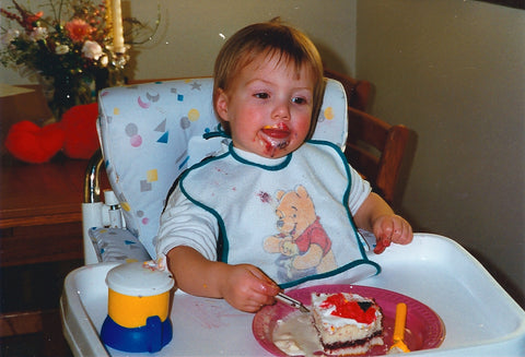 Daughter Annie in highchair