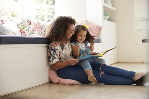 mother and daughter reading