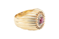 Vintage 18 carat gold cocktail ring with ruby and diamonds