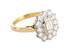 Diamond halo emerald cut vintage engagement ring