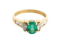 Vintage emerald and diamond three stone ring