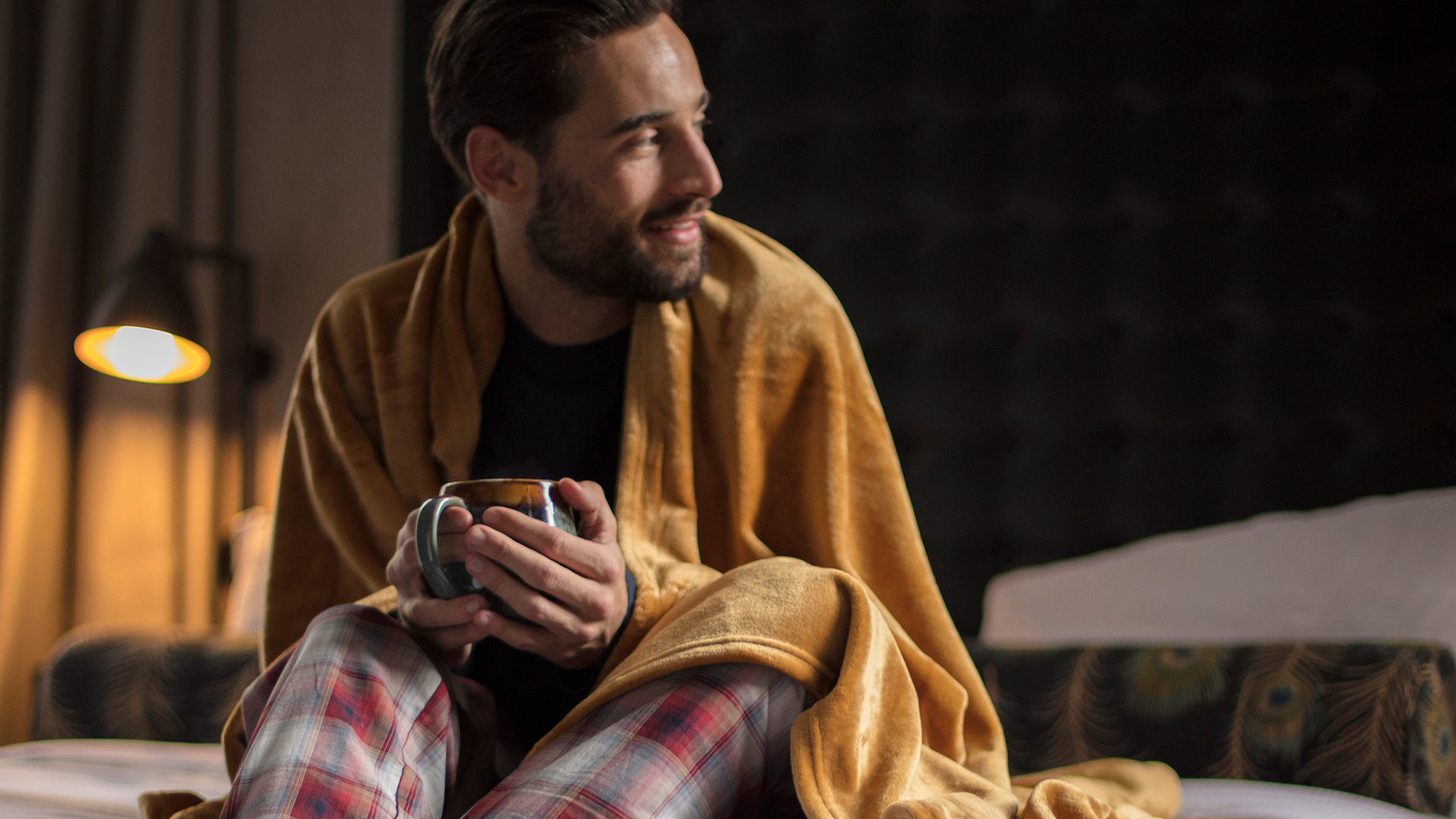 Keeping warm underneath a Heat Holders thermal Oversized Blanket