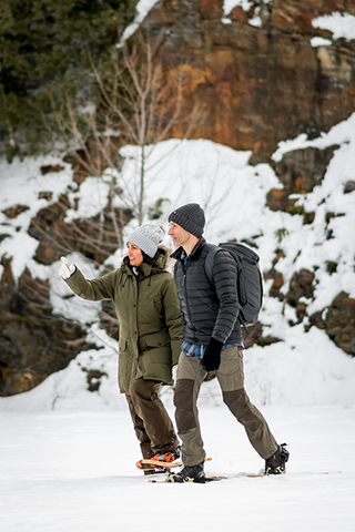 A couple out for a walk in winter wonderland | Heat Holders®