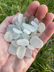 handful of clear and white sea glass seaside harmony