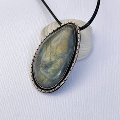 labradorite pendant with lined rim seaside harmony jewelry