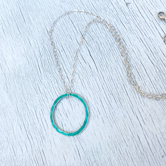 seagreen silver enameled open circle karma necklace 