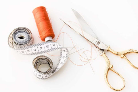 the tools you will need to sew the backpack strap back on