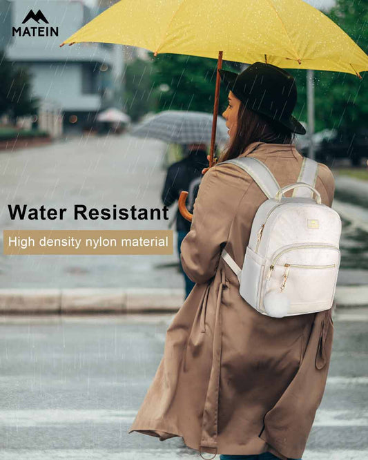 Women stay with Backpack with reusable water bottle in a pocket Stock Photo  by katrinshine